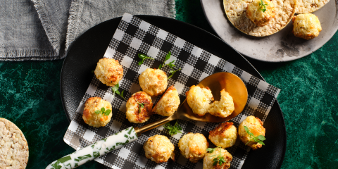 Baked Cauliflower Pieces with Cheese on Corn Thins Slices