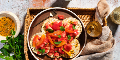 heirloom tomato, blood orange, mint & passionfruit dressing on Corn Thins slices
