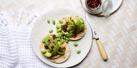 Avocado, edamame & Chilli oil on Corn Thins slices