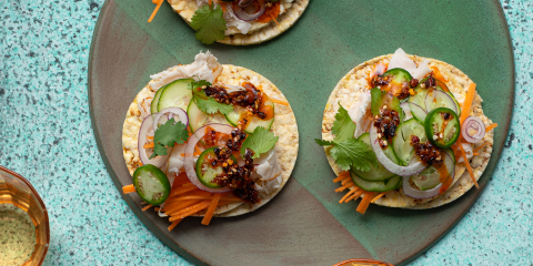 Chicken, carrot, cucumber, red onion, jalapeno, coriander & chilli on Corn Thins slices