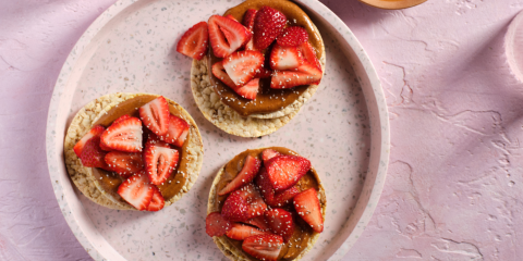 Almond butter, Strawberries & Chia seeds on Corn Thins slices