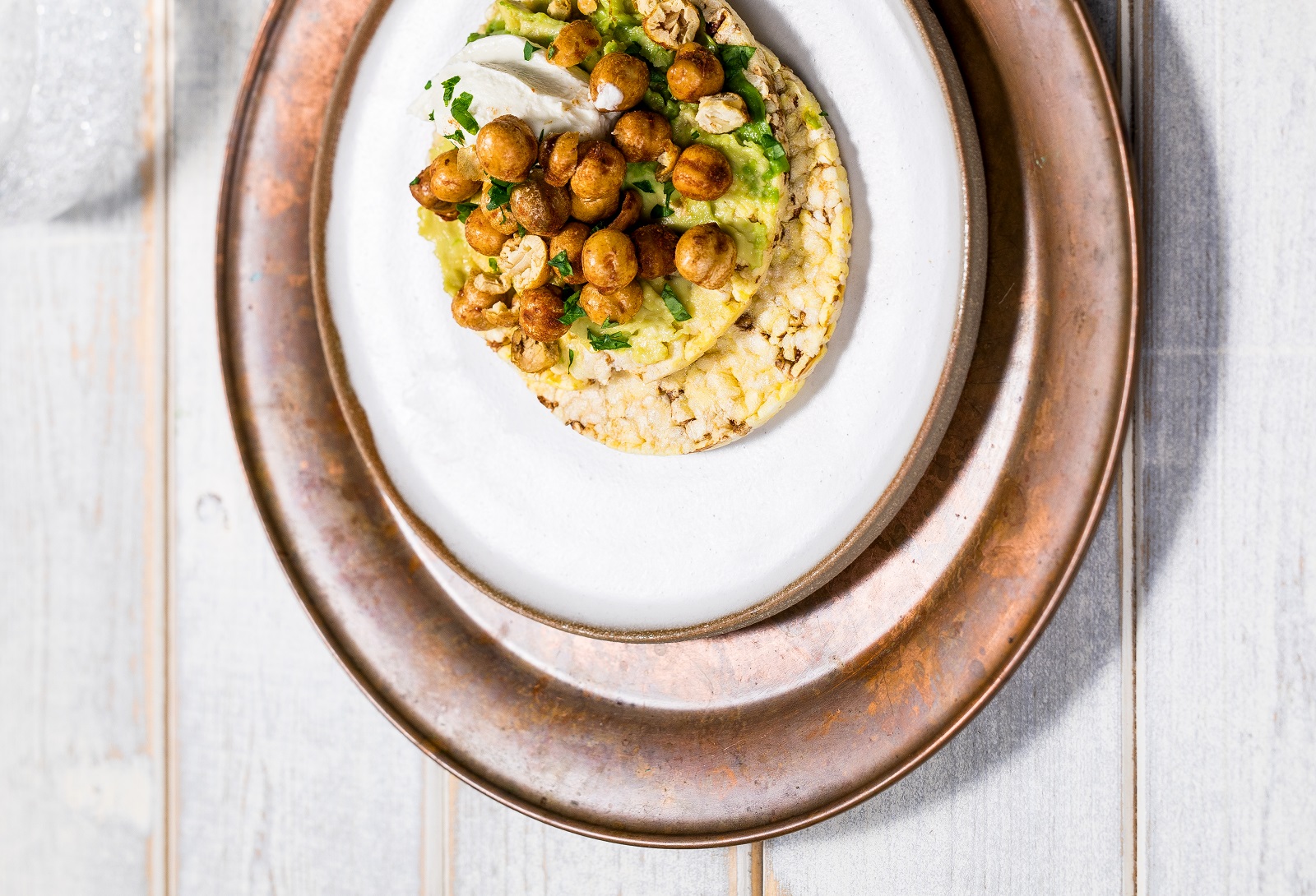 Avocado, Creme Fraiche, Roasted Chickpeas & parsley on CORN THINS slices