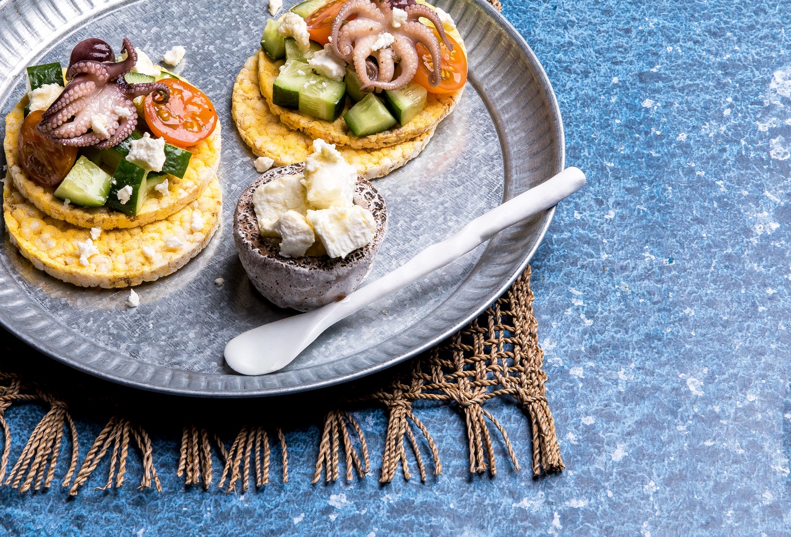 Greek Salad with Baby Octopus on CORN THINS slices