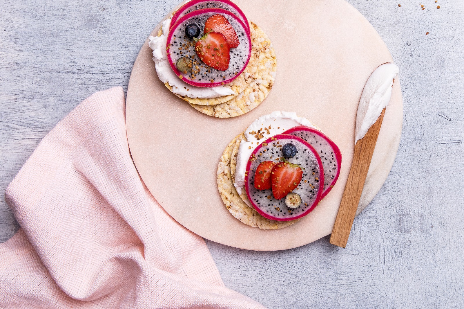 Coconut Yoghurt, Dragonfruit, Strawberries & Blueberries on CORN THINS slices