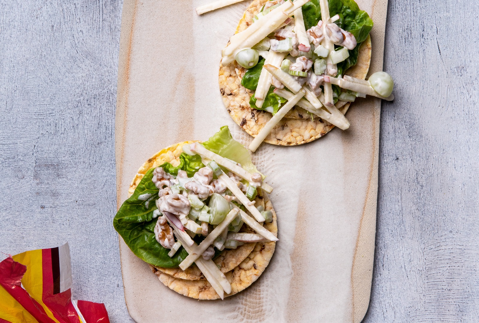 Waldorf Salad (lettuce, apple, grapes, walnuts, celery & mayo) on Corn Thins slices