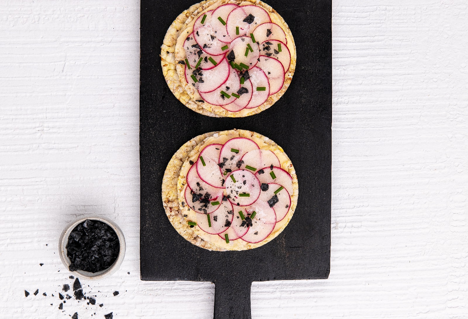 Butter, Radish & Chives on Corn Thins slices as a light vegetarian snack