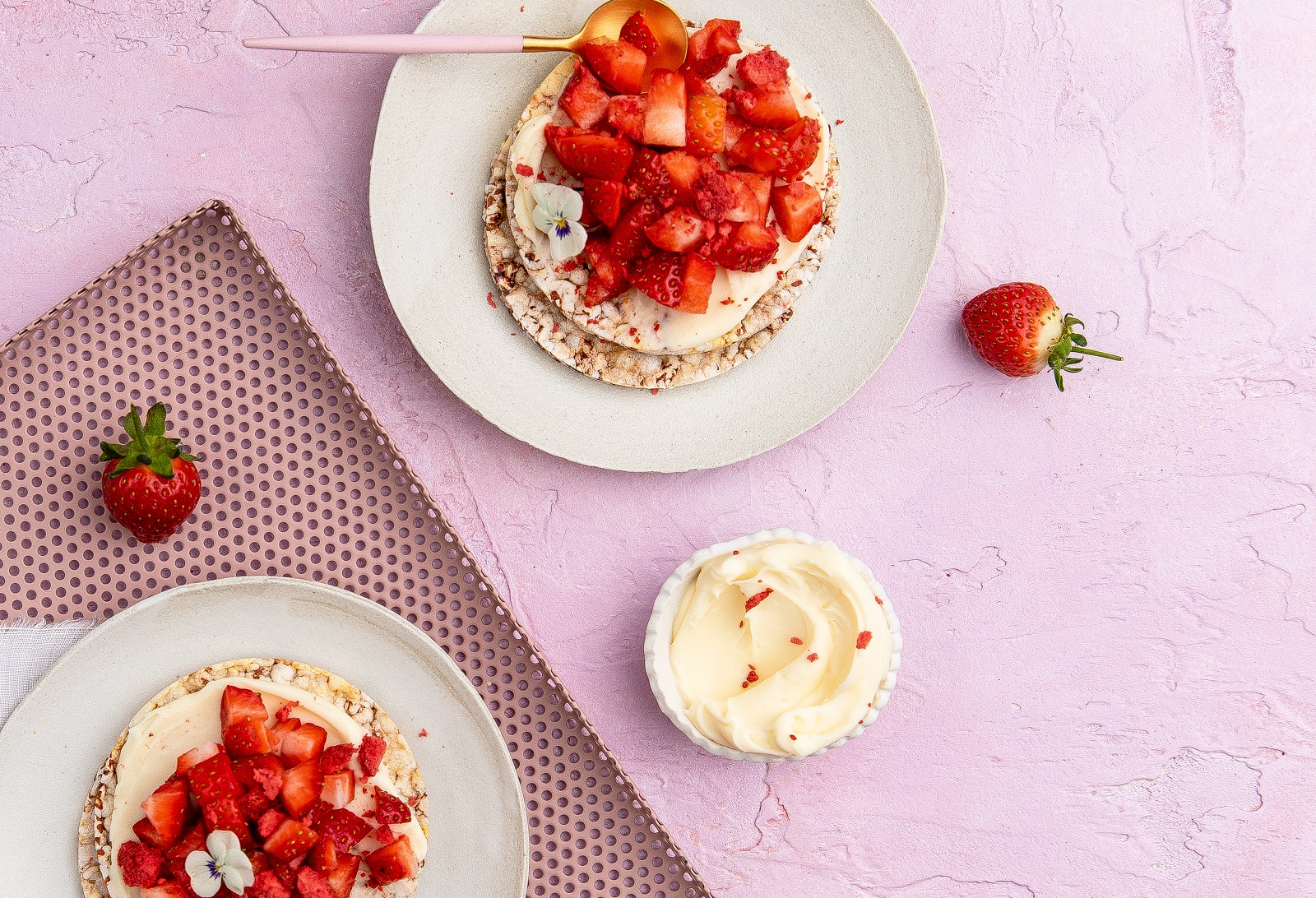 Cream Cheese Icing & Strawberries on Corn Thins slices as a delicious snack