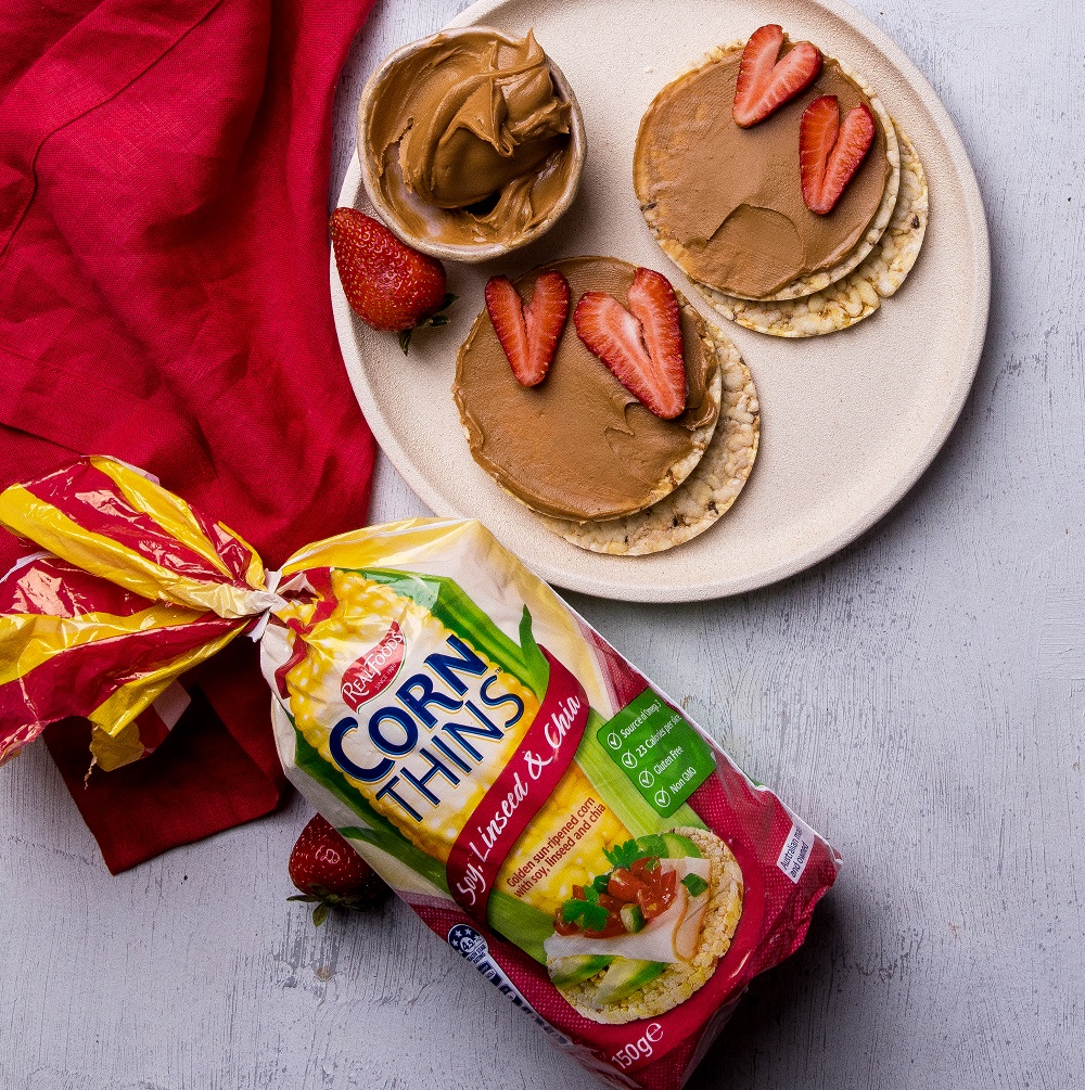 Nut spread & strawberries on Corn Thins slices