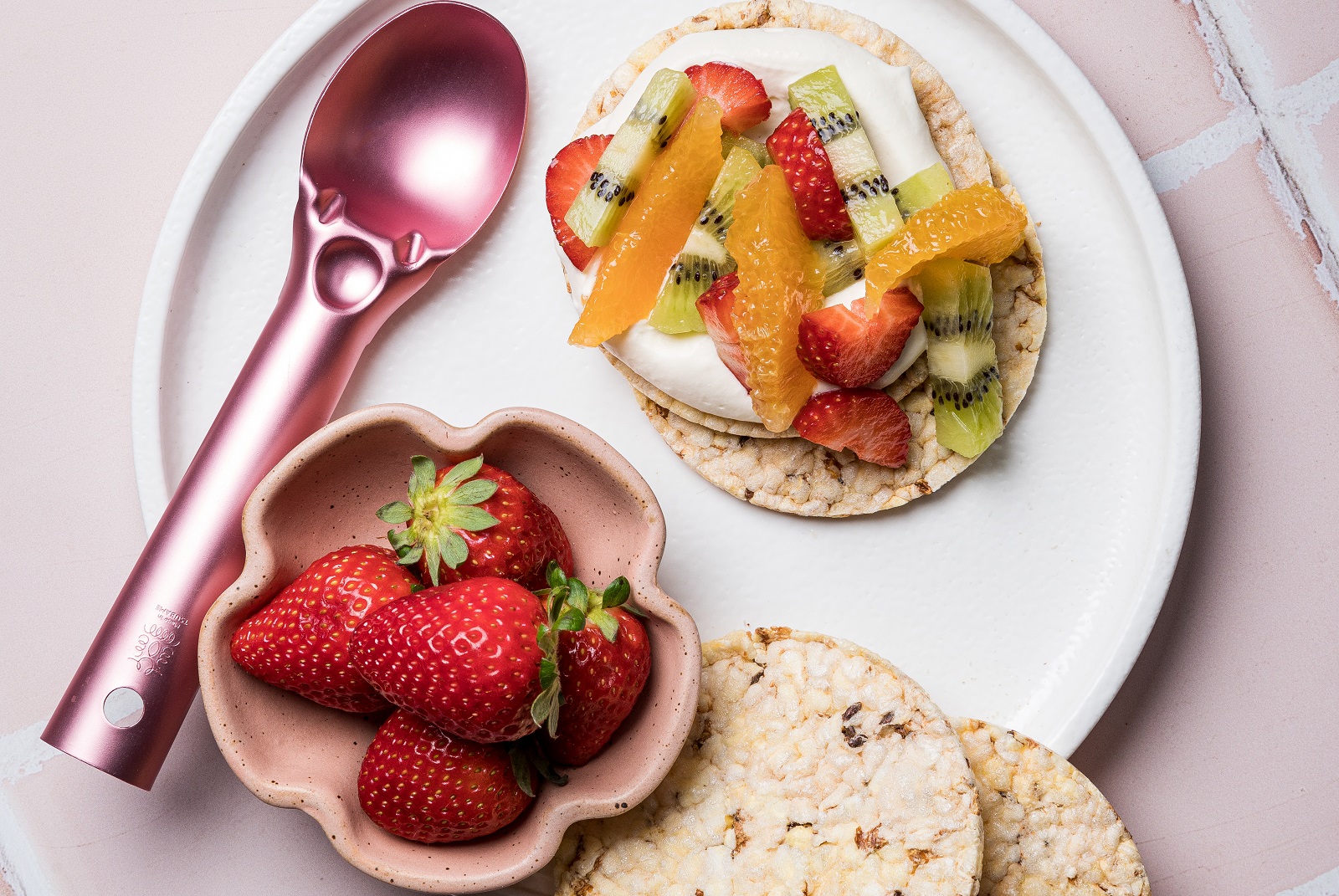 Whipped Cream, Orange, Kiwifruit & Strawberry on Corn Thins slices