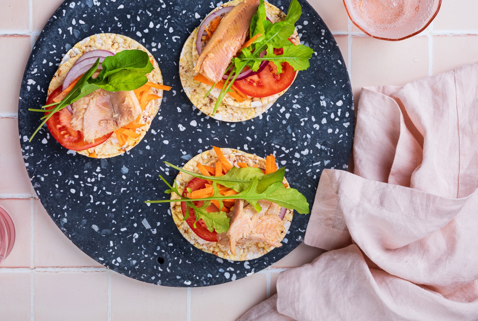 Tomato, Red Onion, Carrot, Rocket, Trout Fillets on Corn Thins slices