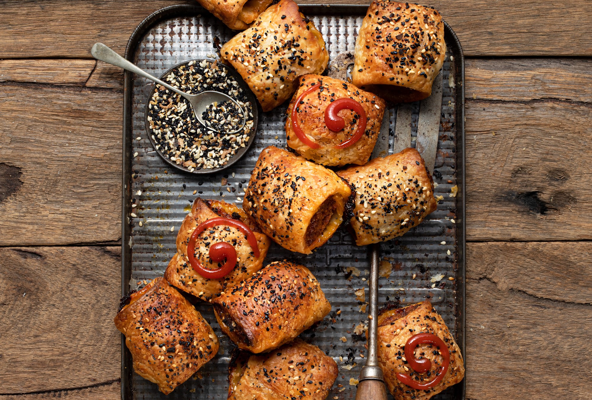 Sausage rolls using Corn Thins slices