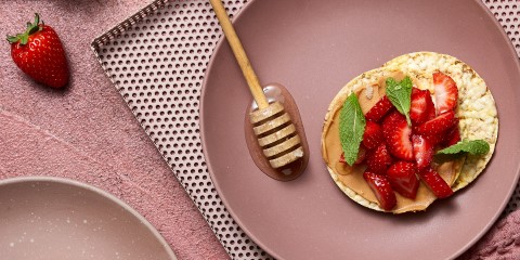 Peanut butter, mint, honey & strawberry on Corn Thins slices