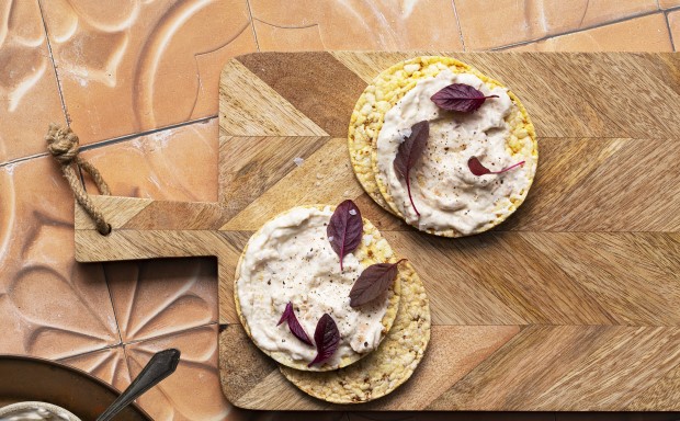 cream cheese mixed with tin pink salmon on Corn Thins slices