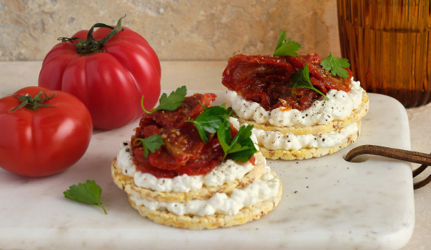 Cottage cheese, confit tomato & parsley on Corn Thins slices