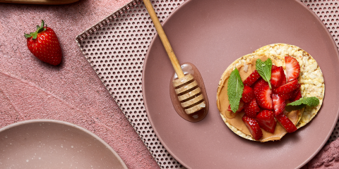 peanut butter, strawberry, honey, mint on Corn Thins slices