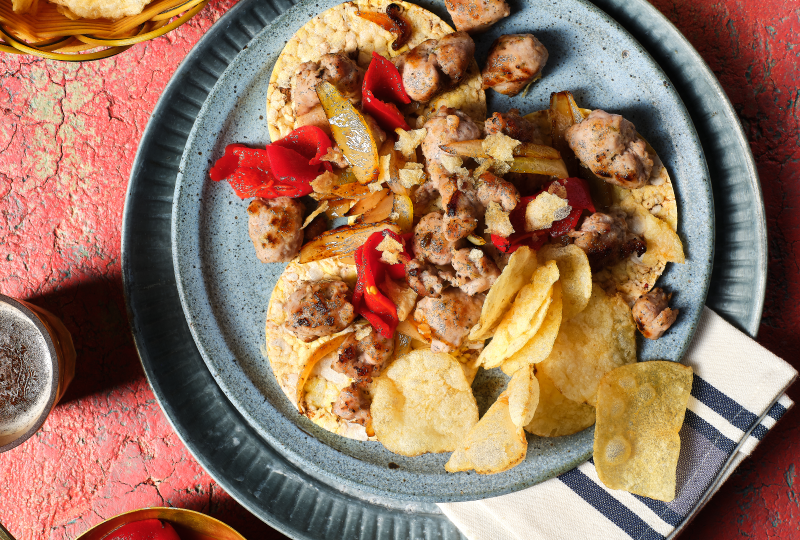 Fried Italian Sausage, Onions & Piquillo Peppers on Corn Thins Slices