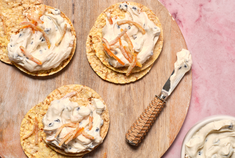 Whipped Ricotta with Hot Cross Bun Spices, Currants & Candies Orange on Corn Thins slices