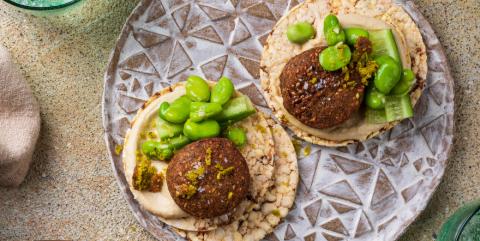 Hommus, falafel, cucumber, broad beans on Corn Thins slices