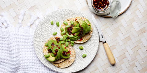 Avocado, Edamame & Chili Oil on Corn Thins slices